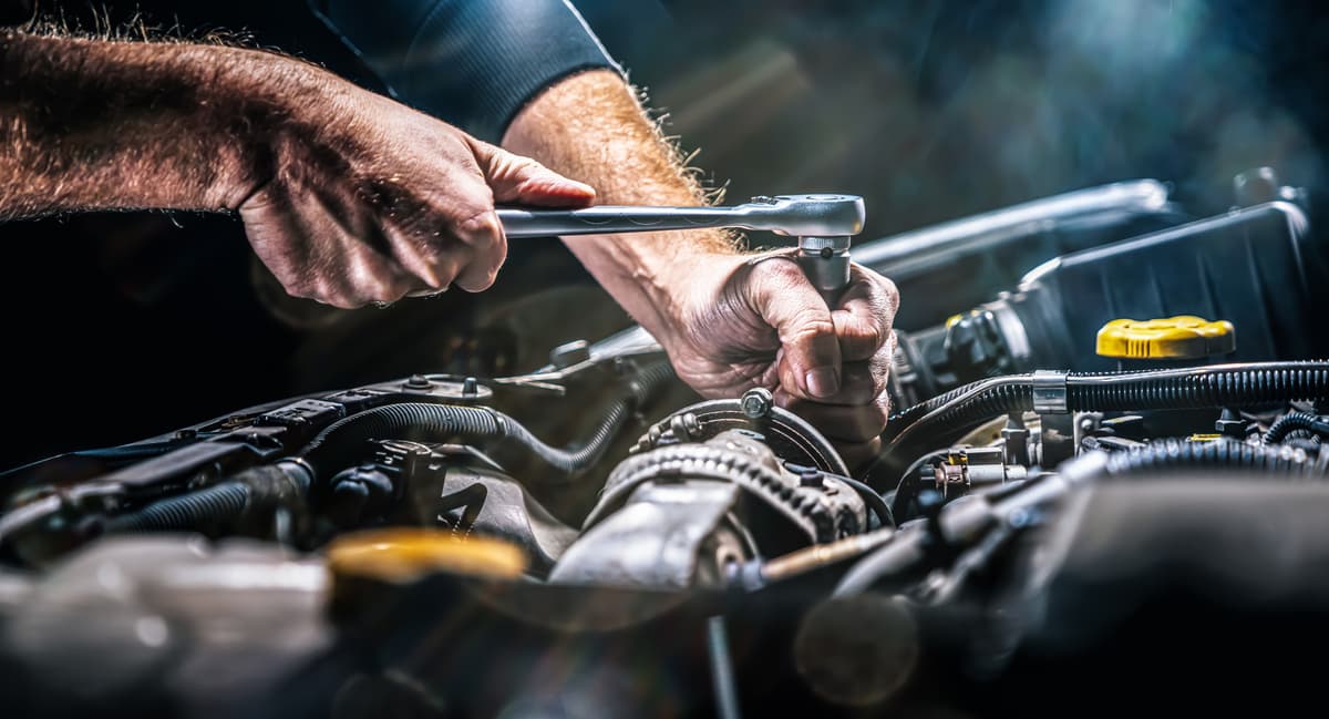 Mechanic working on a car
